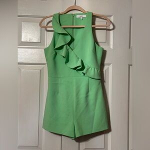 Likely green asymmetrical ruffle lined romper S